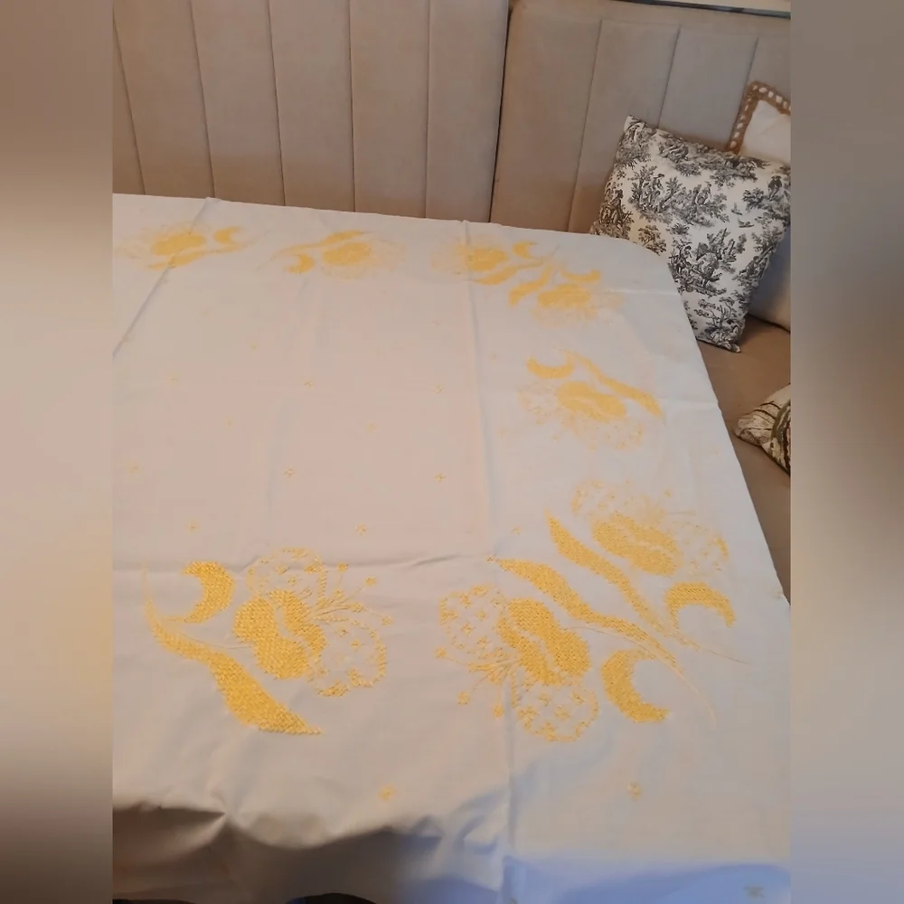 Vintage Cross Stitch Design On White Scalloped Tablecloth